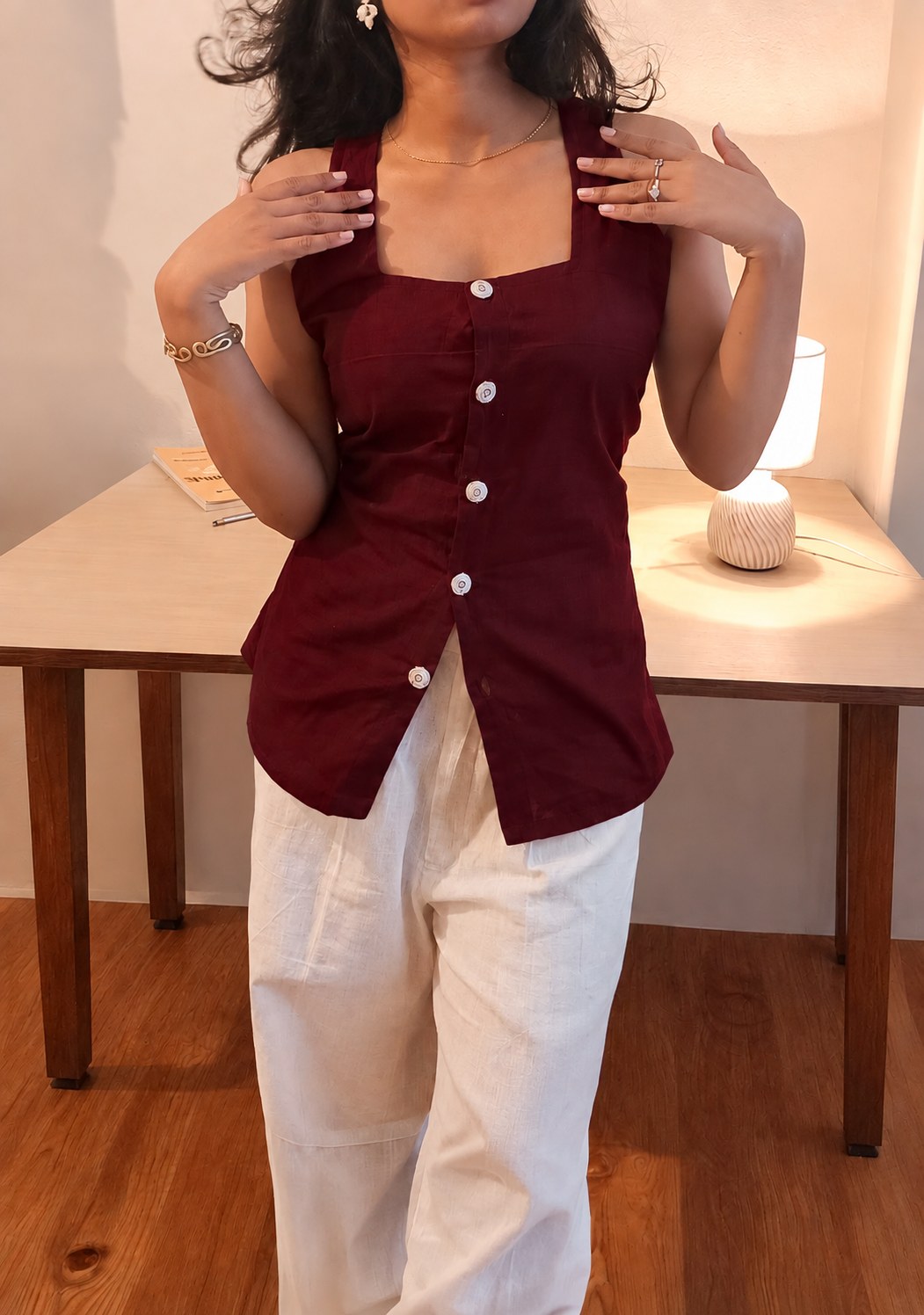 Tara dark maroon 100% cotton top, close front view of the square neckline and button front